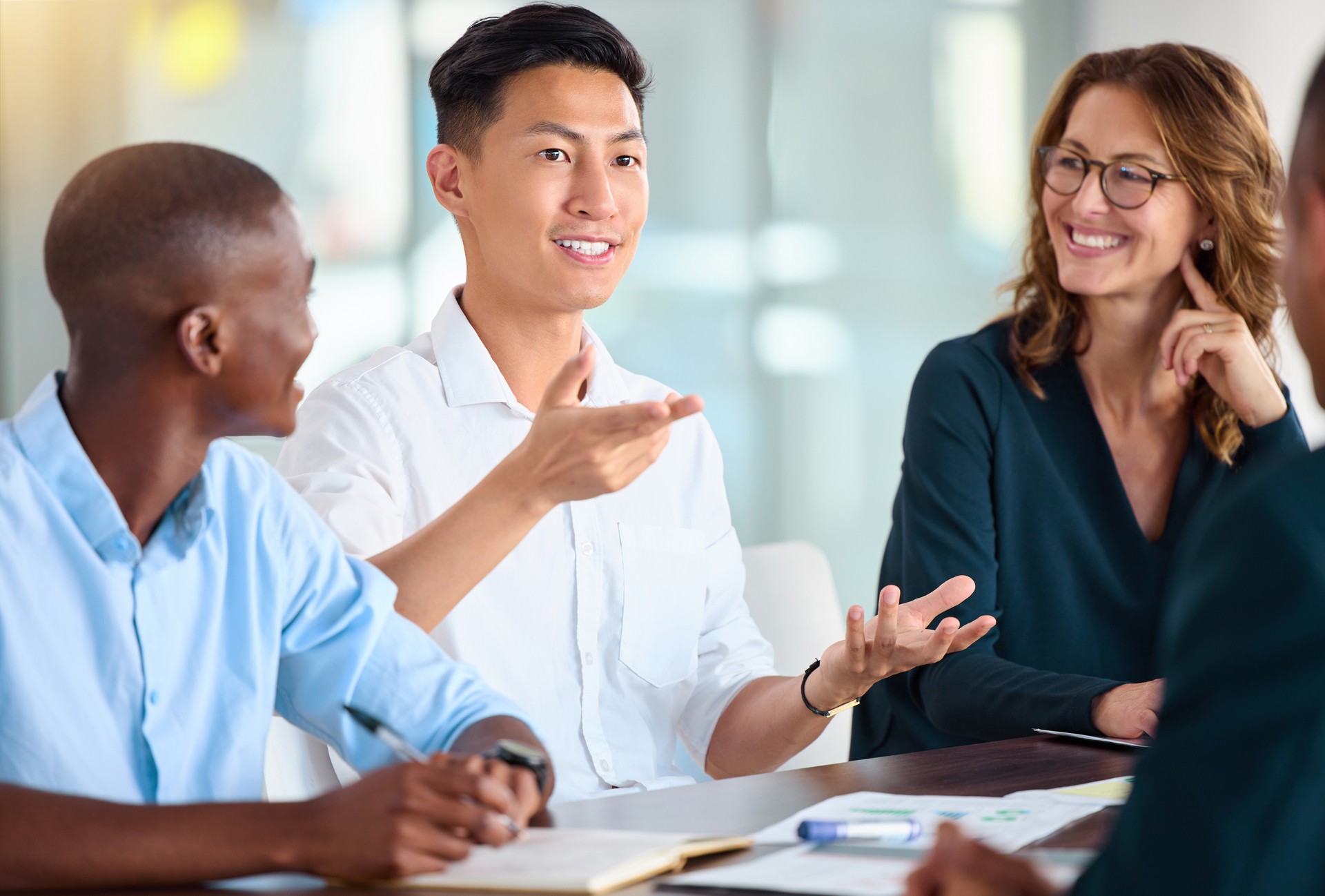 Collaboration of business people in meeting for project management planning an success, goal or strategy for about us and faq. Happy diversity corporate team or employee with idea for company growth